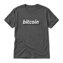 Bitcoin 3D wordmark original artwork on a dark grey heather t-shirt, upright relaxed flatlay on pure white