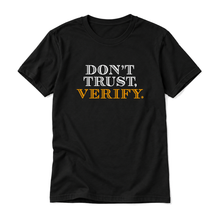 Don't Trust, Verify original artwork on a black t-shirt, upright relaxed flatlay on pure white