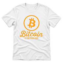 Bitcoin Established 2009 orange graphic on a white t-shirt, upright flatlay on a pure white background
