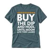 Buy the Dip and HODL original white Bitcoin graphic on a heather deep teal t-shirt, relaxed upright flatlay on pure white