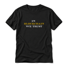 In Blockchain We Trust original artwork on a black t-shirt, upright relaxed flatlay on pure white