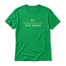 In Blockchain We Trust original artwork on a kelly t-shirt, upright relaxed flatlay on pure white